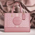Buy Coach Dempsey Carryall In Signature Jacquard With Stripe And Coach Patch Bag Small in Pakistan