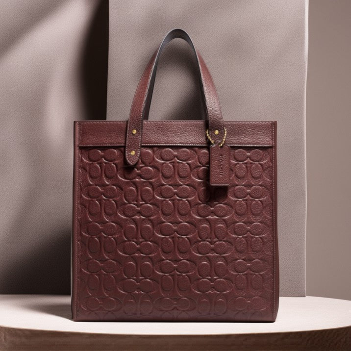 Buy Coach Field Tote In Signature Leather Bag Small - Wine in Pakistan