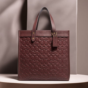 Buy Coach Field Tote In Signature Leather Bag Small - Wine in Pakistan
