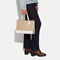 Buy Coach Dempsey Carryall In Signature Jacquard With Stripe And Coach Patch Bag Large - Chalk in Pakistan