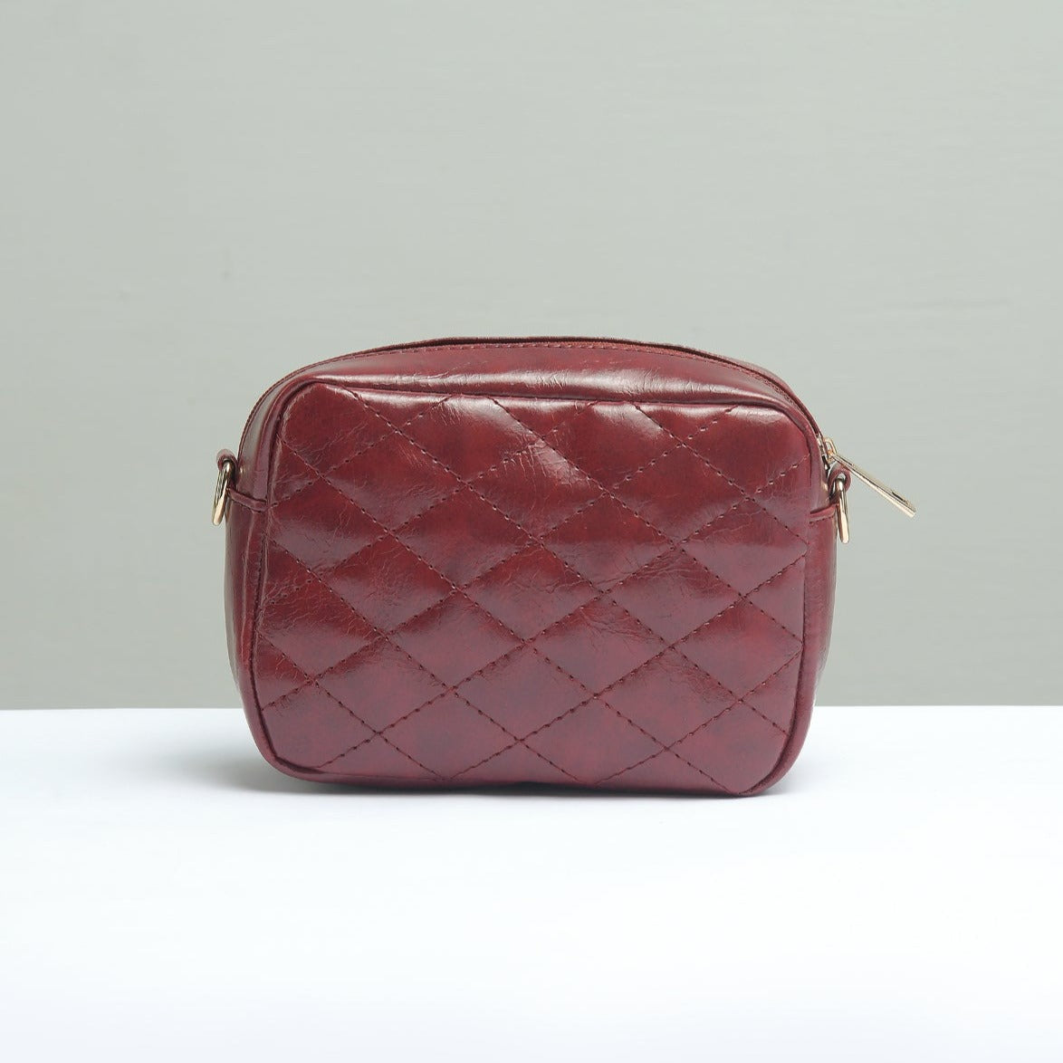 Buy Negative Apparel Mini Quilted Embossed Zip Chain Bag FD - Red in Pakistan