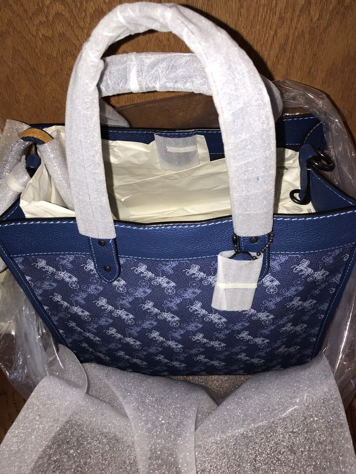 Buy Coach Field Tote In Signature Canvas With Horse And Carriage Print Bag Small - Blue in Pakistan