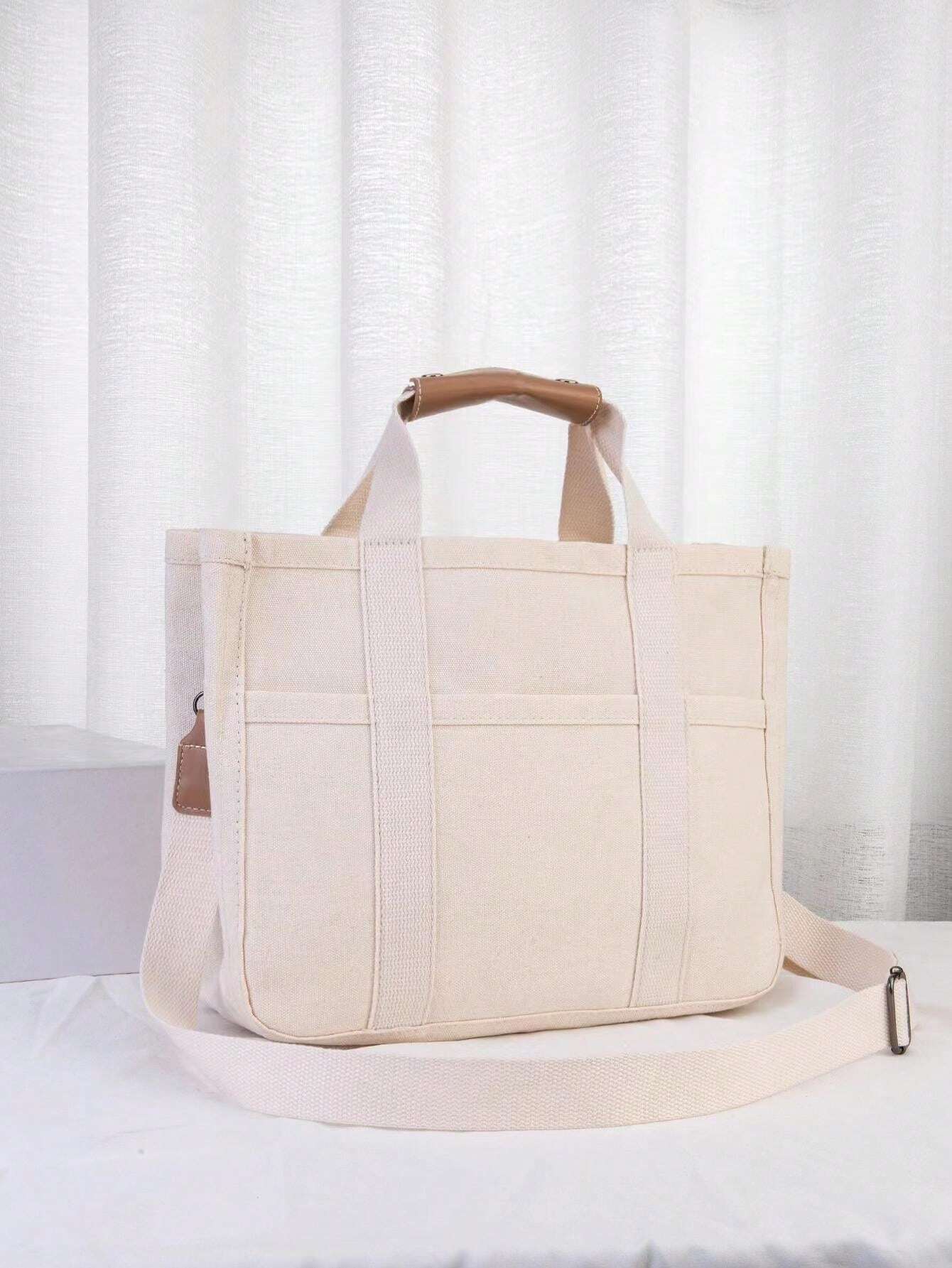 Buy SHEIN 1pc Fashionable Mommy Bag Large Capacity Canvas Shoulder Bag Crossbody Bag Portable Baby Product Storage Bag For Outings in Pakistan