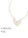 Buy SHEIN 1pc Golden Plated Stainless Steel Necklace With White Acrylic Heart Pendant in Pakistan