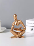 Buy SHEIN Resin Abstract Figure Reading Decorative Desk Ornament in Pakistan