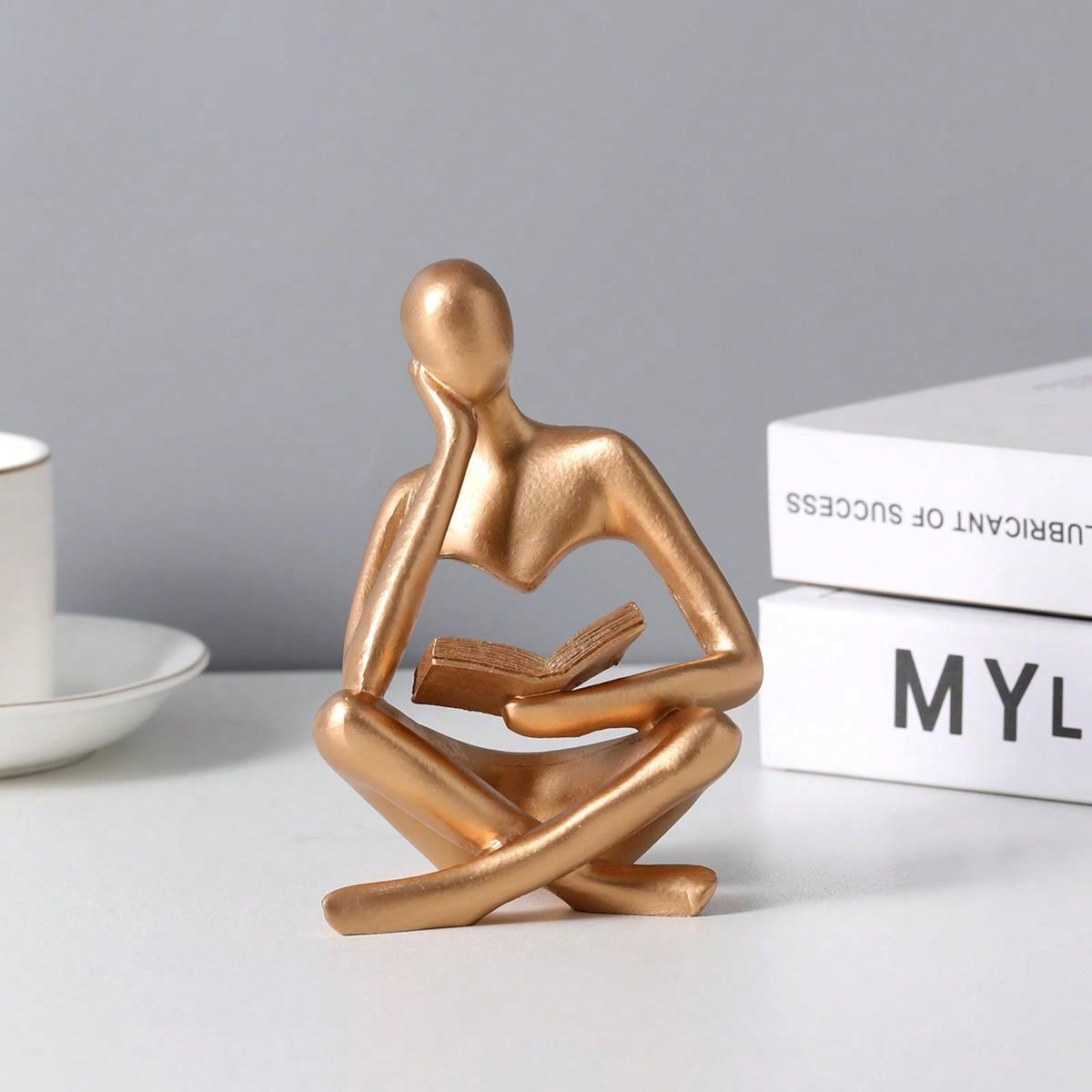 Buy SHEIN Resin Abstract Figure Reading Decorative Desk Ornament in Pakistan