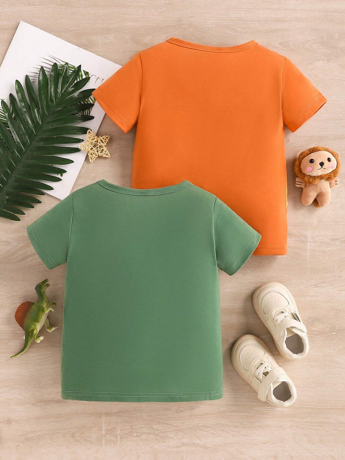 Buy SHEIN Baby Boy 2pcs/Set Cute Animal Dinosaur & Lion Pattern Print Short Sleeve T-Shirt For Spring And Summer in Pakistan