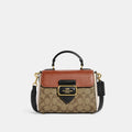 Buy Coach Morgan Top Handle Satchel In Colorblock Signature Canvas in Pakistan