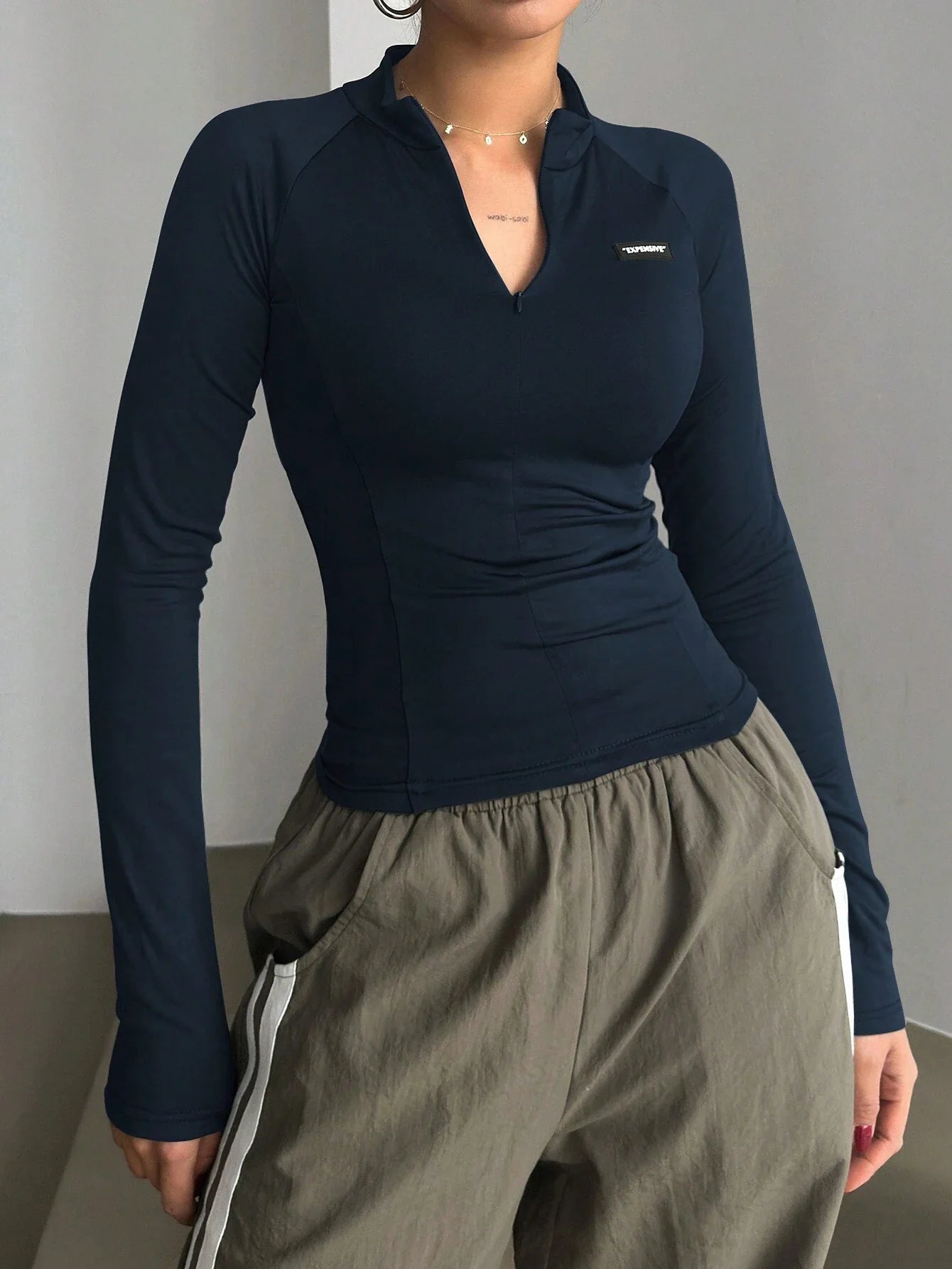Buy DAZY Half Turtleneck Half Placket Letter Silicone Printed Slim Fit Long Sleeve Women T-Shirt in Pakistan