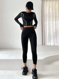 Buy SHEIN DAZY Women'S Color Block Rolled Edge Top With Solid Color Leggings Two Piece Set in Pakistan