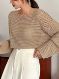 Buy SHEIN DAZY Women Solid Color Basic Round Neck Hollow Knitted Sweater in Pakistan