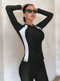 Buy SHEIN DAZY Women's Sporty Swimwear Jacket, Black And White Color Block Long Sleeve Zipper Swim Coat, Conservative Sun-Protective Slim-Fit Swimming Jacket, Suitable For Vacation Diving (Without Pants) Summer in Pakistan