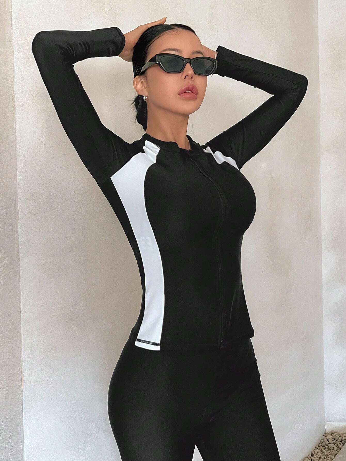 Buy SHEIN DAZY Women's Sporty Swimwear Jacket, Black And White Color Block Long Sleeve Zipper Swim Coat, Conservative Sun-Protective Slim-Fit Swimming Jacket, Suitable For Vacation Diving (Without Pants) Summer in Pakistan