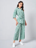 Buy SHEIN Clasi Collared Self Belted Allover Print Blouse & Wide Leg Pants Set in Pakistan