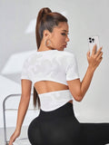 Buy SHEIN Cut Out Back Raglan Sleeve Crop Sports Tee Fitted Shirt in Pakistan