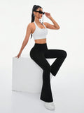 Buy SHEIN Daily&Casual Women's Solid Color Flare Activewear Pants in Pakistan