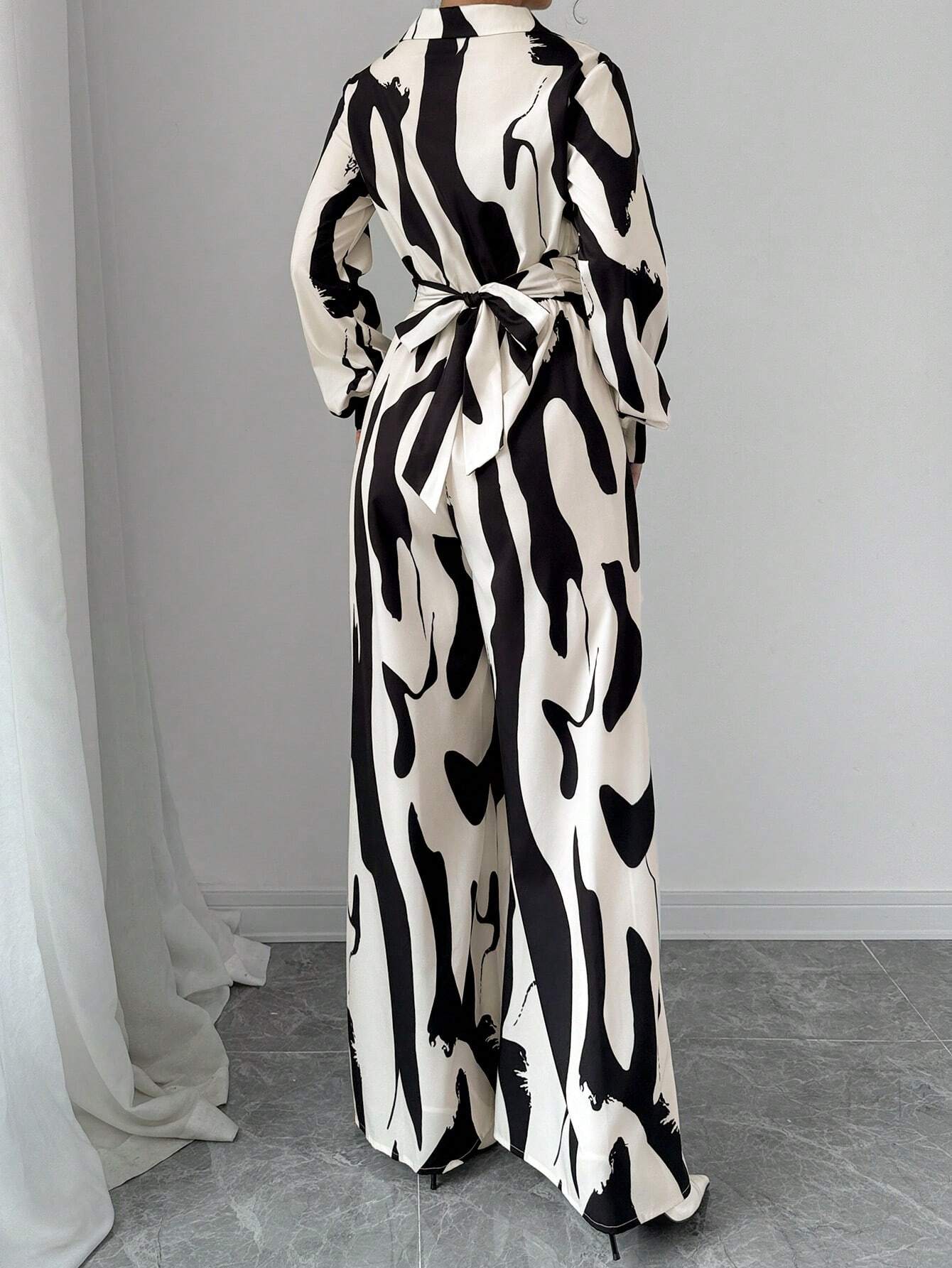Buy SHEIN Privé Women's Contrast Color Printed Long Sleeve Tie Front Jumpsuit in Pakistan