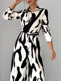 Buy SHEIN Privé Women's Contrast Color Printed Long Sleeve Tie Front Jumpsuit in Pakistan