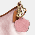 Buy Coach Laurel Shoulder Bag In Signature Canvas With Charms in Pakistan