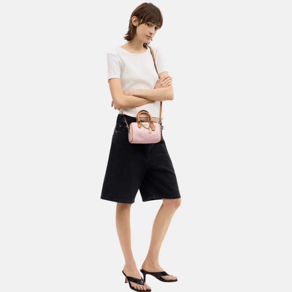 Buy Coach Mini Rowan Crossbody Bag In Signature Canvas With Charms in Pakistan