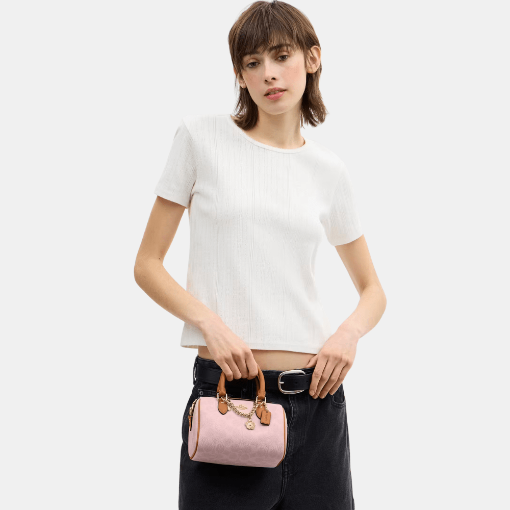 Buy Coach Mini Rowan Crossbody Bag In Signature Canvas With Charms in Pakistan