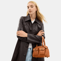 Buy Coach Twin Turnlock 20 Bag in Pakistan