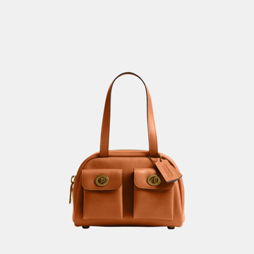 Buy Coach Twin Turnlock 20 Bag in Pakistan