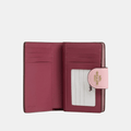 Buy Coach Mini Wallet In Signature Canvas (Powder Pink) in Pakistan
