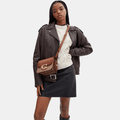 Buy Coach Idol Bag In Signature Canvas With Snakeskin Detail in Pakistan