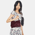Buy Tory Burch Small Kira Diamond Quilt Distressed Shoulder Bag (Dark Carmine) in Pakistan