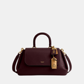 Buy Coach Slouchy Rogue Top Handle Bag in Pakistan