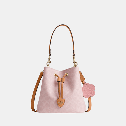 Buy Coach Rowan Bucket Bag In Signature Canvas With Charms in Pakistan