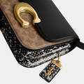 Buy Coach Idol Bag In Signature Canvas With Snakeskin Detail in Pakistan