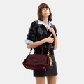 Buy Coach Slouchy Rogue Top Handle Bag in Pakistan