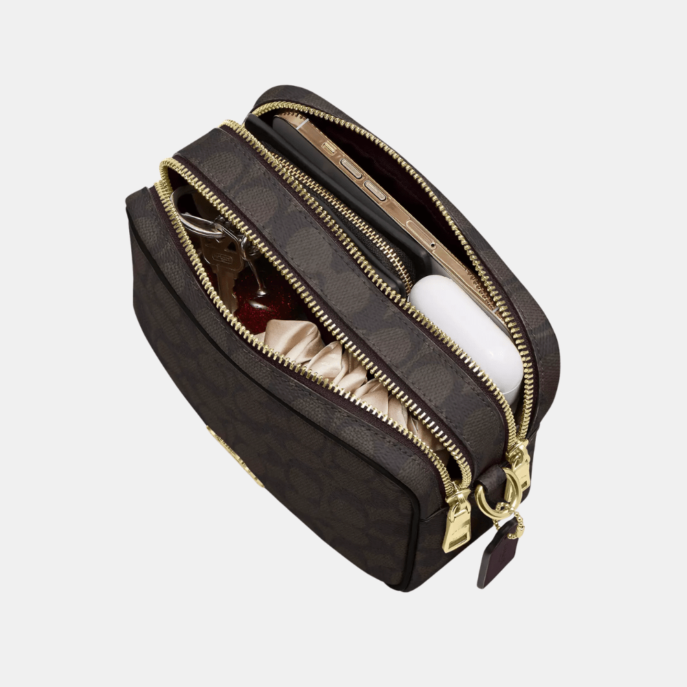 Buy Coach Mini Carey Crossbody Bag In Signature Canvas in Pakistan