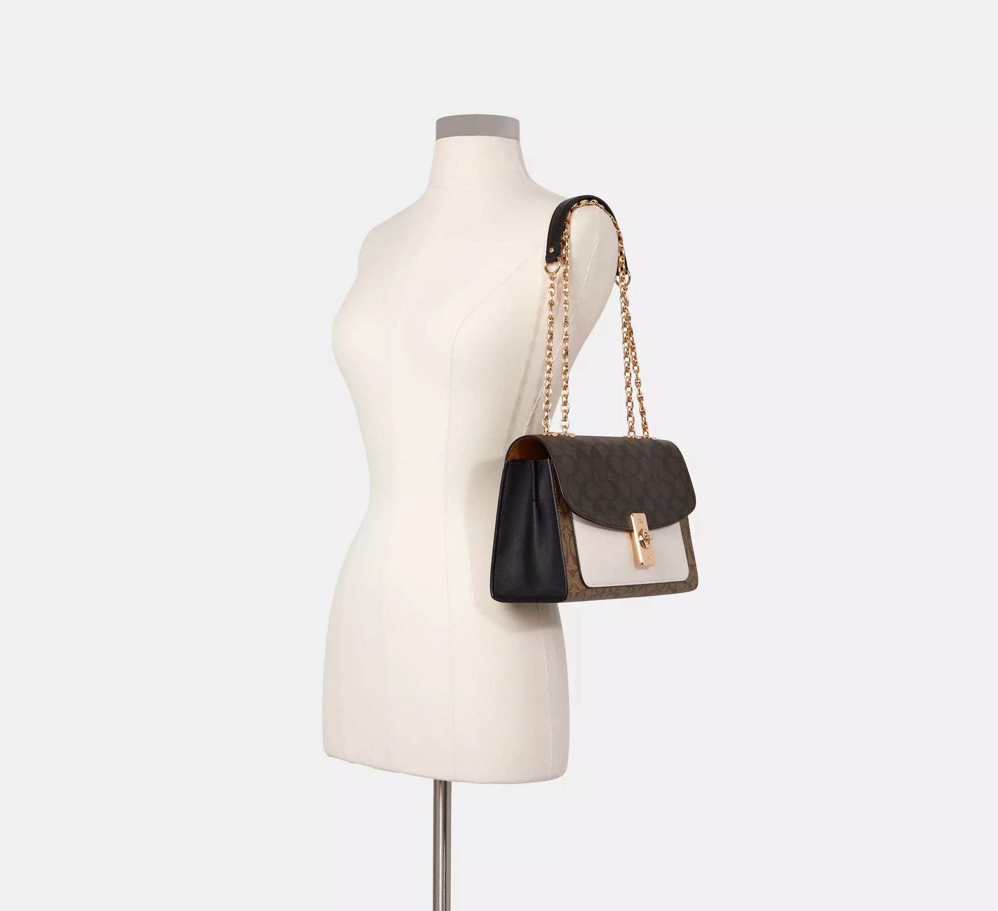 Buy Coach Lane Shoulder Bag In Blocked Signature Canvas in Pakistan