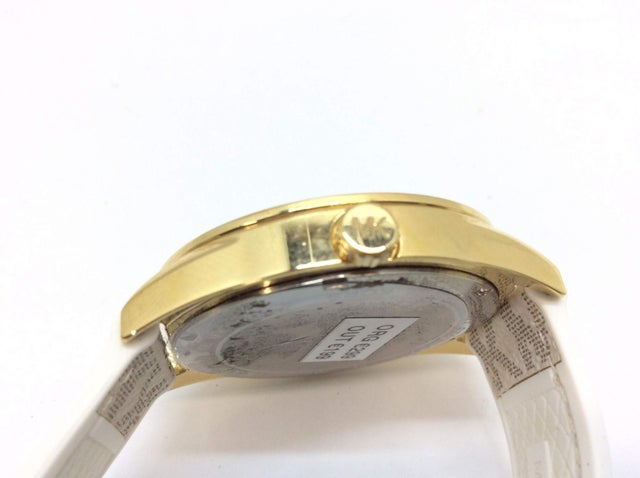 Buy Michael Kors Jessa Gold Dial with Diamonds White Leather Strap Watch for Women - MK7204 in Pakistan