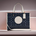 Buy Coach Dempsey Carryall In Signature Jacquard With Stripe And Coach Patch Bag Small in Pakistan