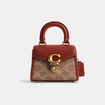 Buy Coach Sammy 21 Top Handle In Signature Canvas in Pakistan
