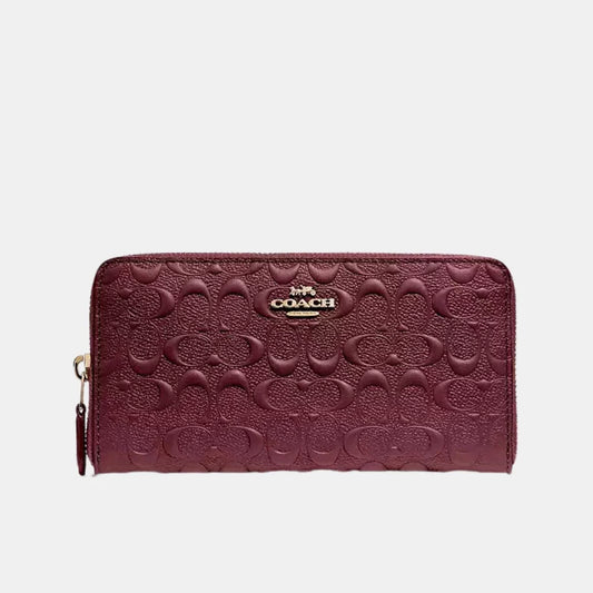 Buy Coach Accordion Zip Wallet in Signature Debossed Patent Leather (Maroon) in Pakistan