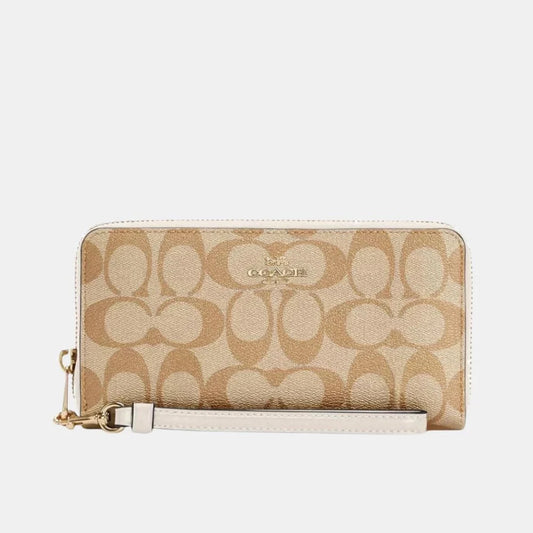 Buy Coach Long Zip Around Wallet In Signature Canvas in Pakistan