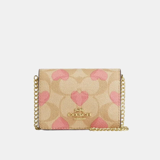 Buy Coach Mini Wallet On A Chain In Signature Canvas With Heart Print in Pakistan