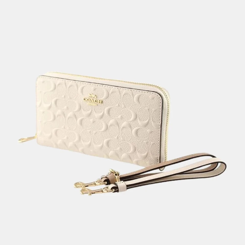 Buy Coach Accordion Zip Wallet in Signature Debossed Patent Leather (White) in Pakistan