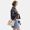 Buy Coach Maggie Small Tote Bag In Blocked Signature Canvas in Pakistan