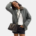 Buy Coach Maggie Small Tote Bag In Blocked Signature Canvas in Pakistan