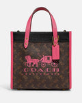 Buy Coach Field Tote In Signature Canvas With Horse And Carriage Print Bag Small - Pink in Pakistan