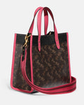 Buy Coach Field Tote In Signature Canvas With Horse And Carriage Print Bag Small - Pink in Pakistan