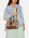 Buy Coach Dempsey Carryall In Signature Jacquard With Stripe And Coach Patch Bag Large - Khaki in Pakistan
