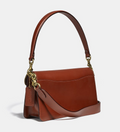 Buy Coach Tabby Light Polished Pebble Leather Mini Wristlet Crossbody Bag in Pakistan
