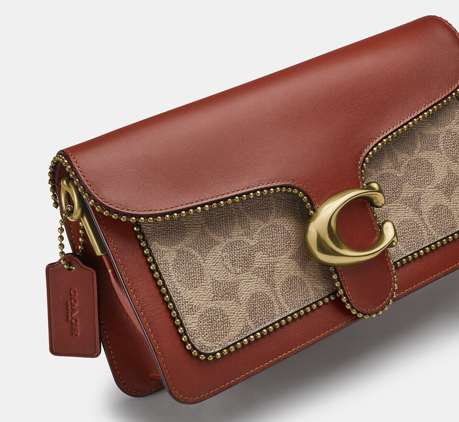 Buy Coach Tabby Light Polished Pebble Leather Mini Wristlet Crossbody Bag in Pakistan